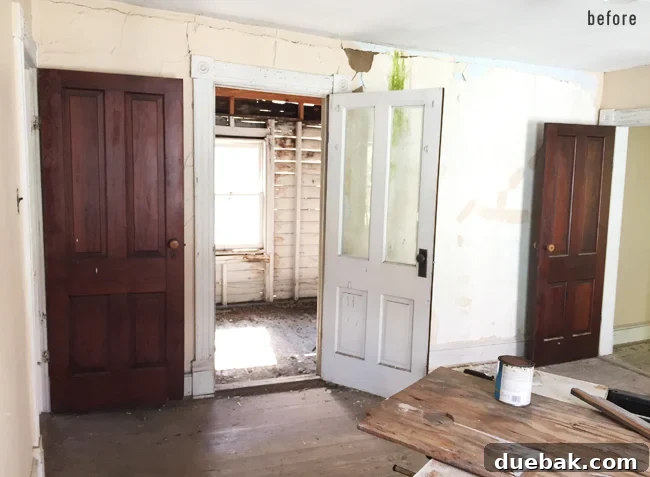 From Studs Up: The Beach House Revival 20 Before view from the middle bedroom looking towards the old, damaged porch area.