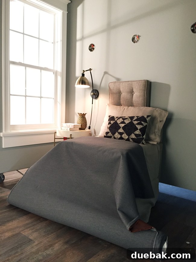 Behind the scenes of faking a headboard with an armchair and fabric
