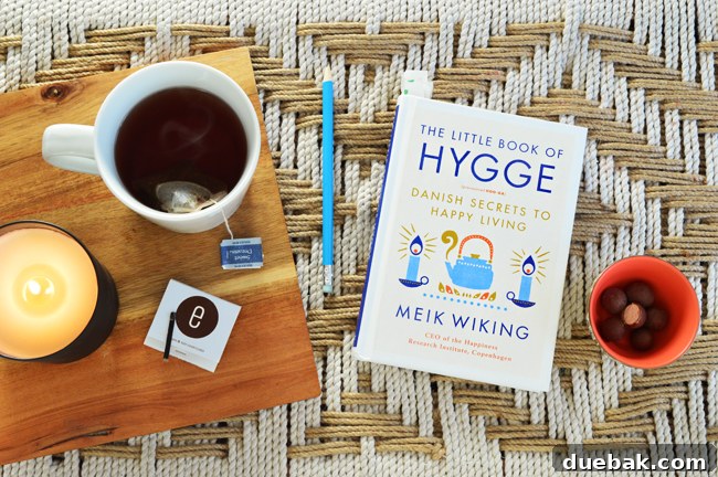 Making House Cleaning Less of a Chore 2 The Little Book of Hygge by Meik Wiking on a table, symbolizing cozy Danish living.