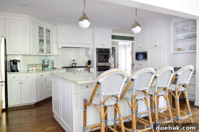 Kitchen After Remodel with Island and Stainless Steel Appliances