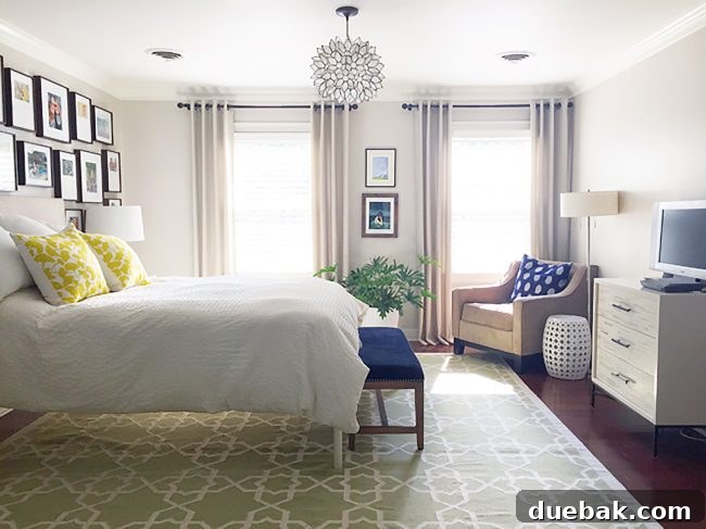 Light Up Your Sleep: Bedroom Refresh with a Chandelier and New Bed 4 Bedroom with hardwood floors, greige walls, and a gallery wall above the bed.