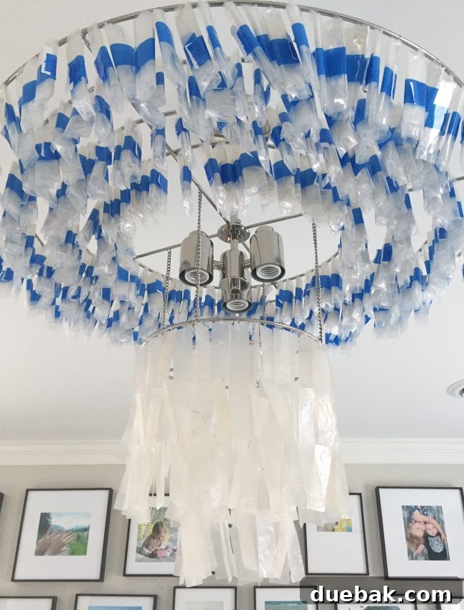 Light Up Your Sleep: Bedroom Refresh with a Chandelier and New Bed 8 Partially unwrapped capiz chandelier strands, showing the tedious but necessary packaging.