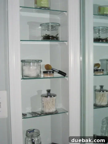 Custom Open Shelving for Bathroom Essentials glass-open-shelving-diy-how-to-make-bathroom-storage-solution