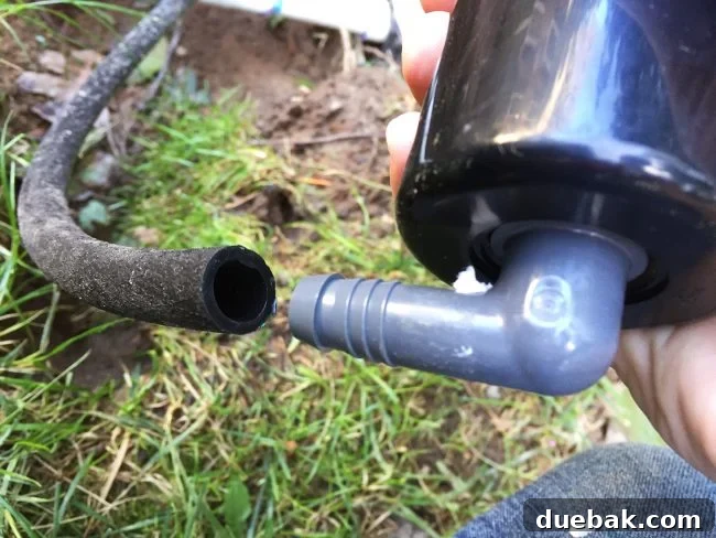 Connecting a swing pipe elbow on a sprinkler head to a flexible funny pipe during installation