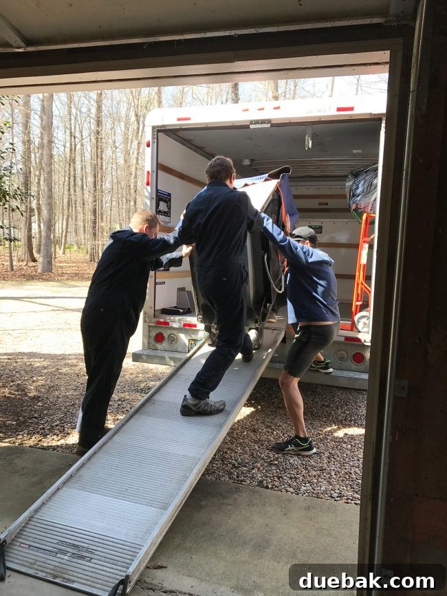 Coastal Kitchen Star: The Retro Rose Oven 5 John helping to move the heavy pink stove