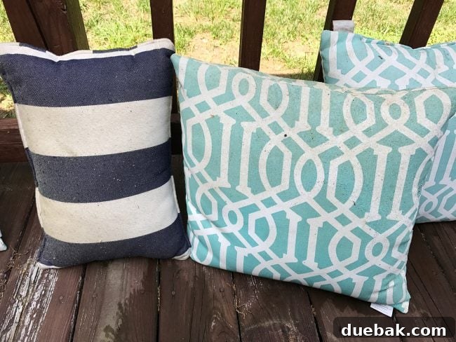 Outdoor cushions heavily soiled with pollen and dirt, indicating a need for deep cleaning.