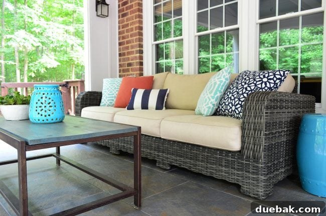 Another view of the clean sunroom, showcasing the inviting atmosphere and meticulously maintained outdoor furniture.