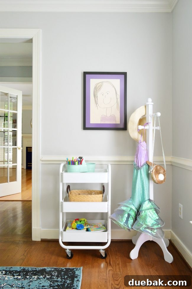 White rolling cart and coat rack in a kids' study room