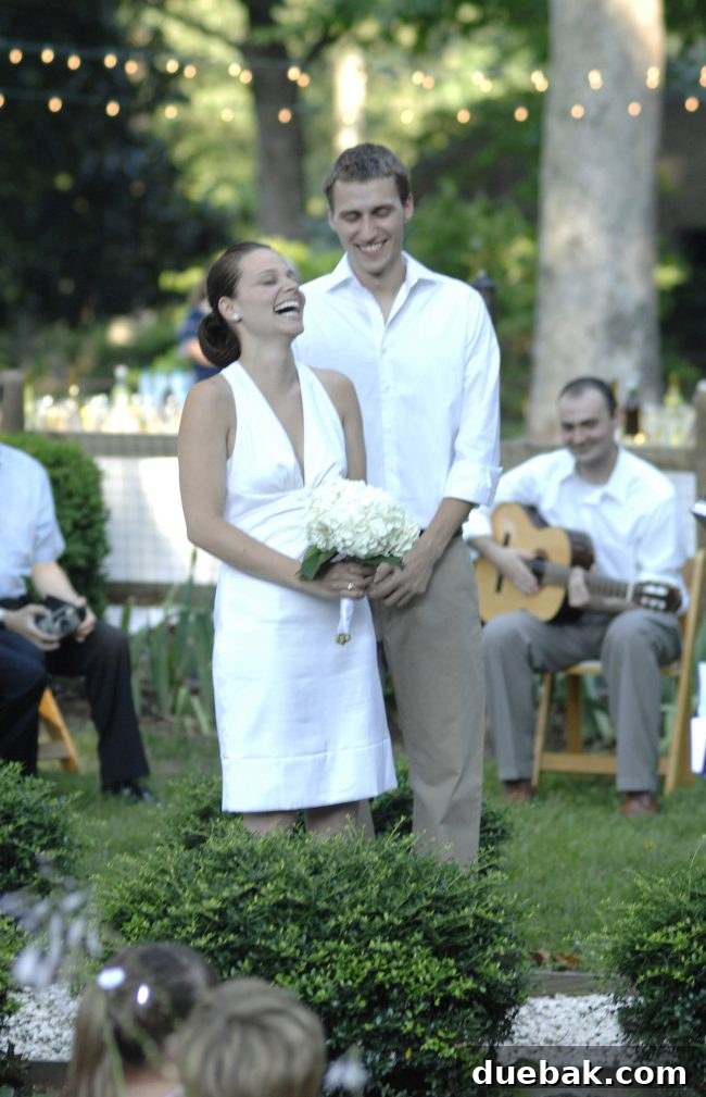 Happy couple at their backyard wedding