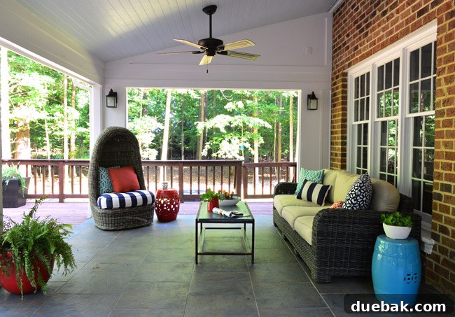 Patriotic Curb Appeal 9 A beautifully styled back porch featuring cohesive red, white, and blue outdoor decor, perfect for year-round patriotic enjoyment.