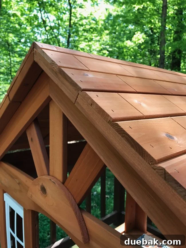 Close-up view of the interlocking roof detail on the cedar wooden playhouse