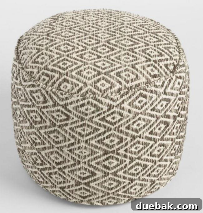 Labor Day Home Refresh: Furniture and Decor Savings 13 Neutral patterned pouf from World Market, a versatile decor accent.