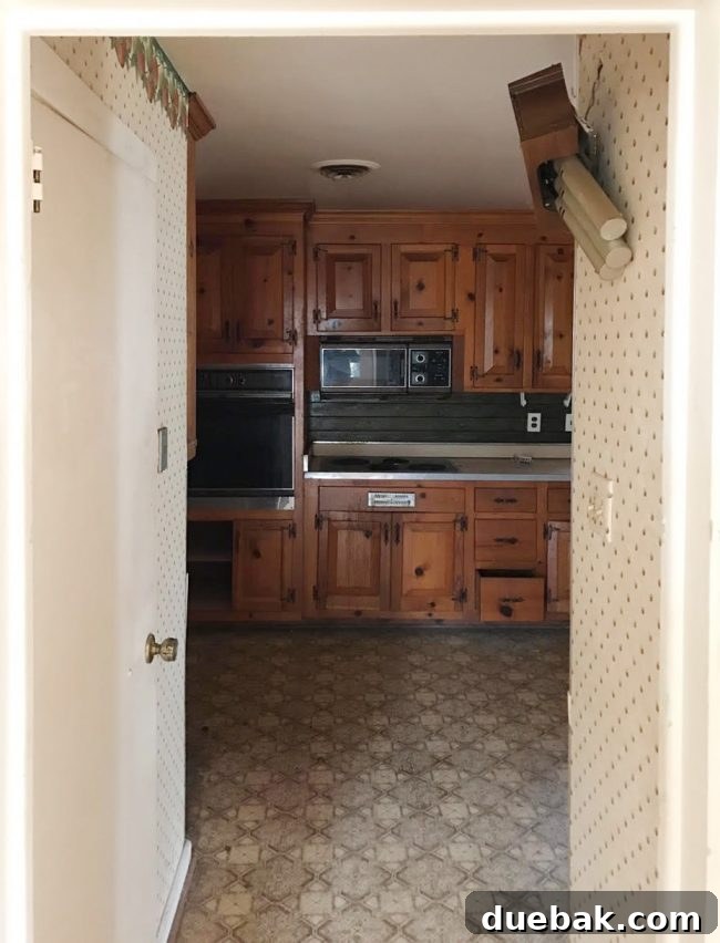 Before photo of a dated kitchen