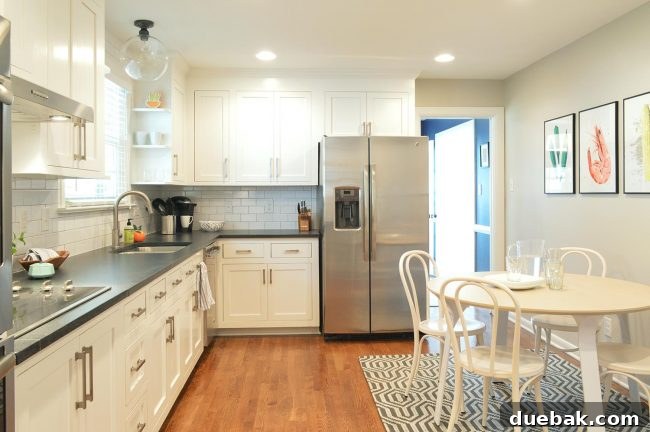 Kitchen view showing the cafe table and chairs