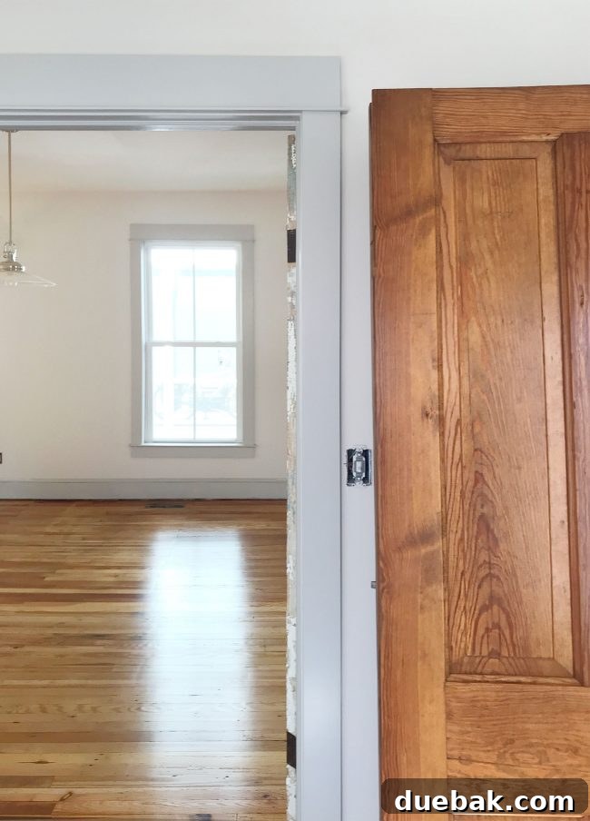 Restored pine doors and refinished pine floors showcasing historical detail
