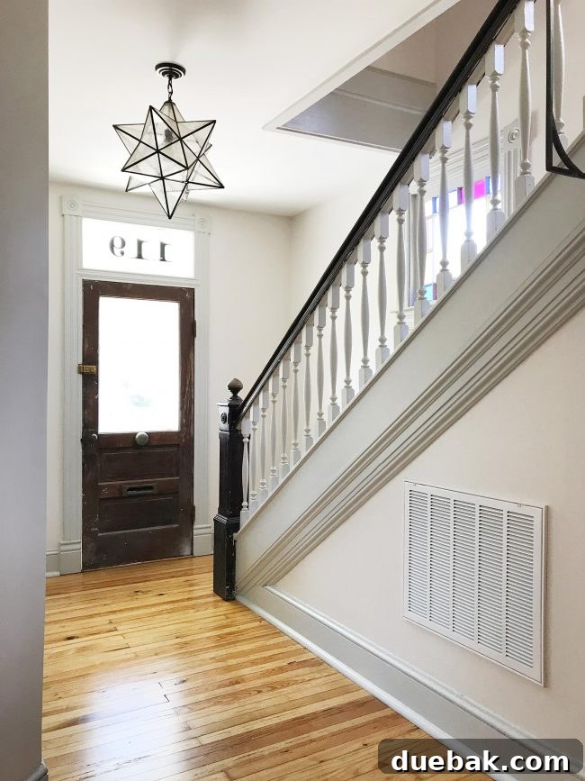 Coastal Comforts Await 13 House numbers applied to a transom window