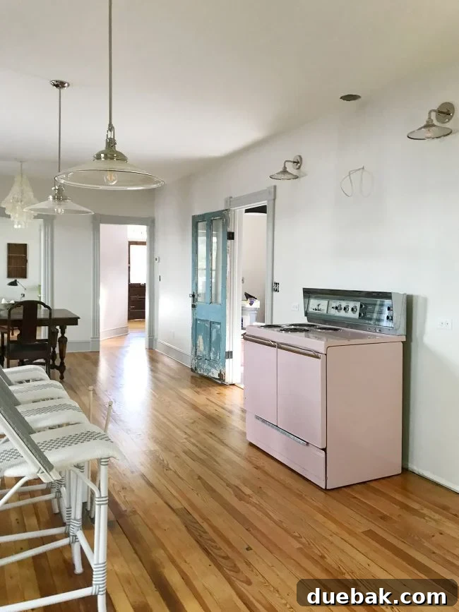 Coastal Comforts Await 7 Kitchen view showing boxed cabinets and installed stove