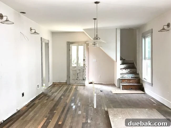 Beach house kitchen during demolition phase with exposed walls