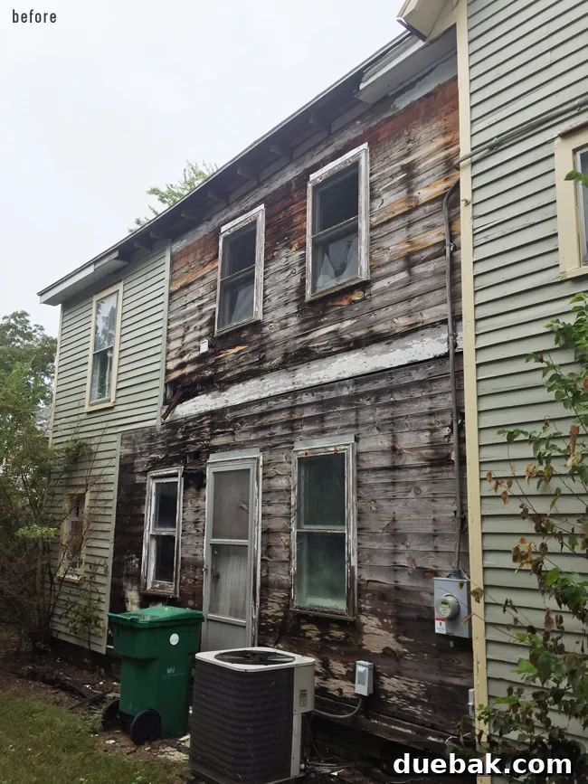 Our Epic Fridge Feud 7 Severely rotted siding on the beach house