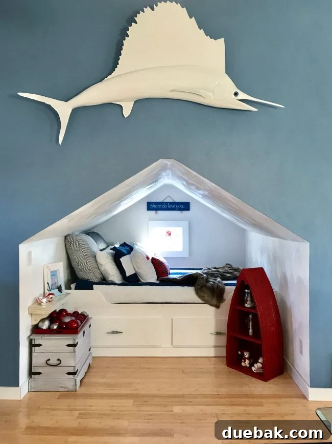 A cozy kids' bunk room in a finished attic, featuring four full beds tucked into nooks