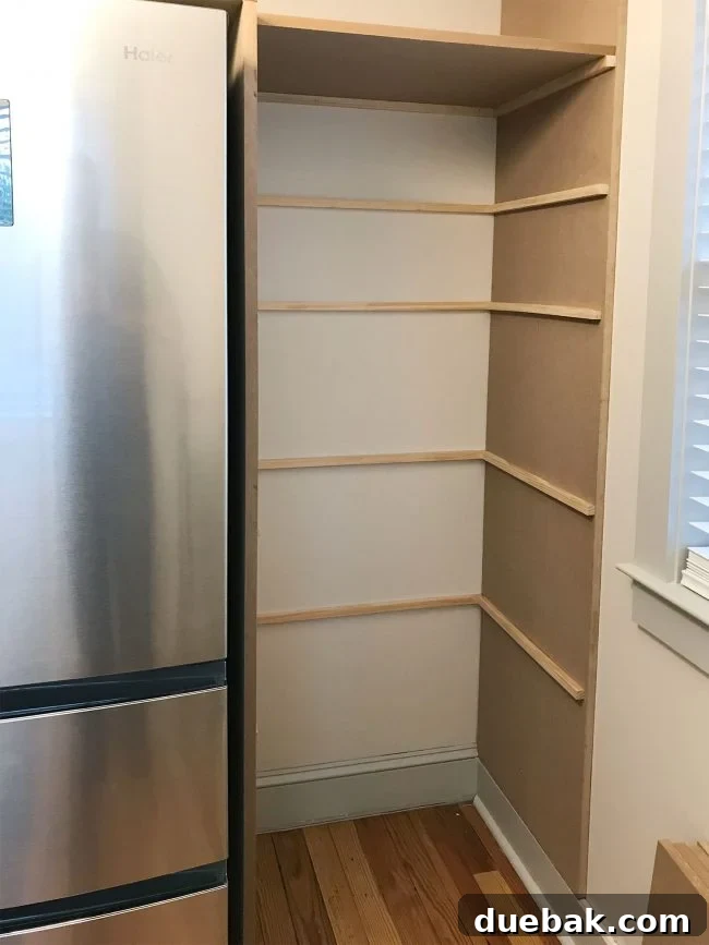 thin brace pieces added where pantry shelves will rest