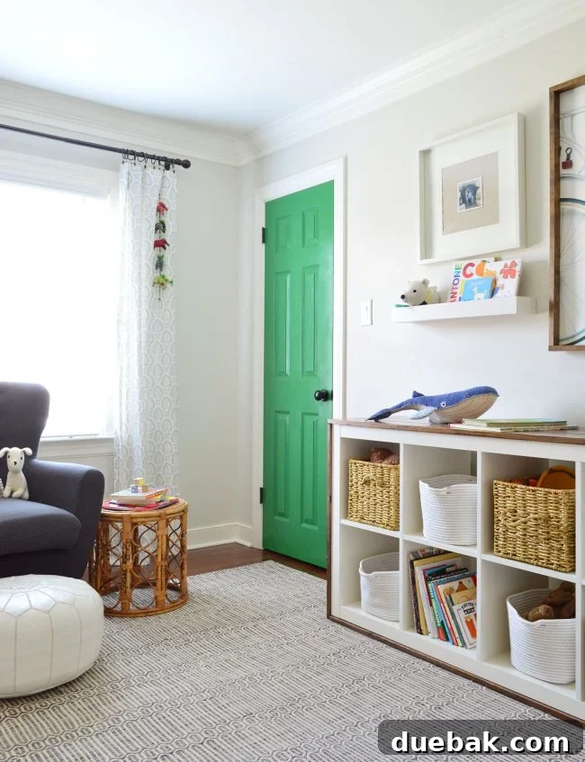 Transforming Our Son's Space 11 Boy's bedroom with green closet door, bike art, and organized storage