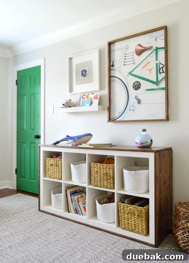 Transforming Our Son's Space 12 Organized bookcase with woven and fabric bins in boy's room