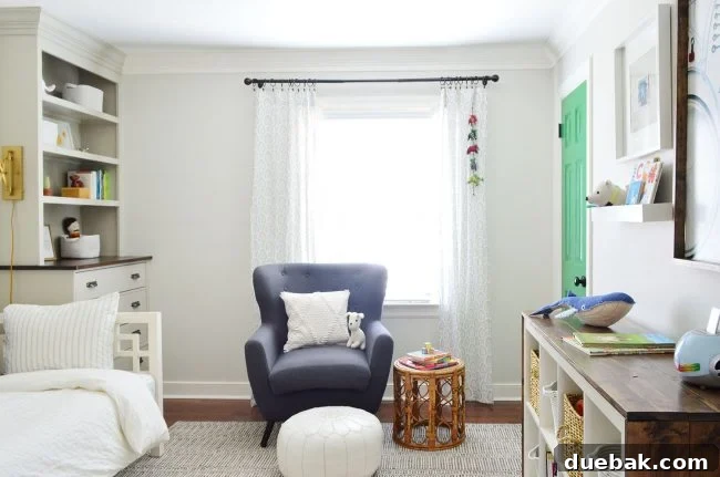 Transforming Our Son's Space 10 Cozy reading corner in boy's bedroom with chair, pouf, and side table