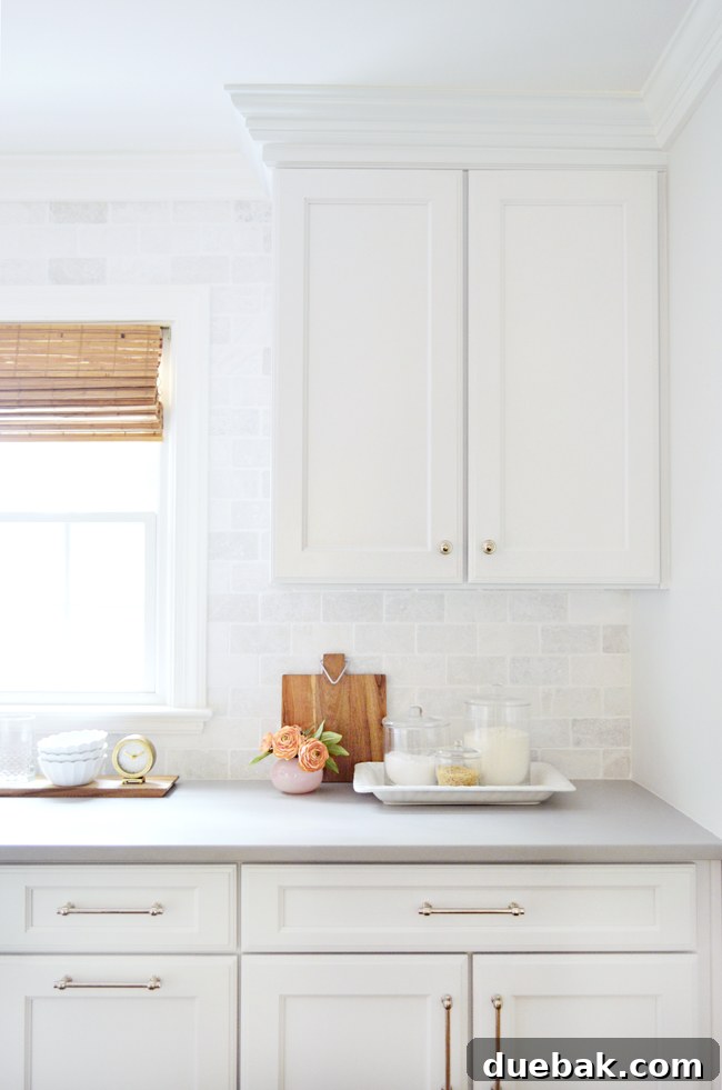Kitchen counter with various glass storage containers holding ingredients.