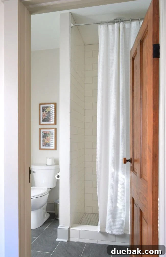 Downstairs bathroom with extra-long shower curtain