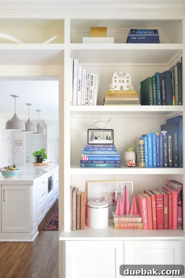 The Mistakes We Made In Our Beach House Kitchen Design 6 Christmas decorated living room with color-grouped bookshelves