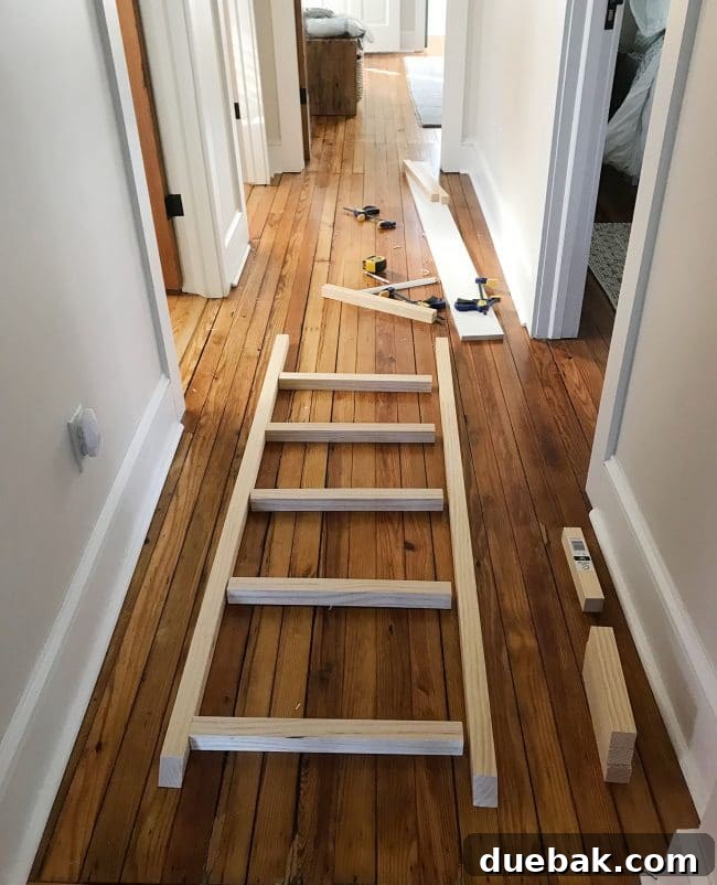 Constructing Bespoke Bunk Beds 20 Pieces of 2x2 wood for the bunk bed ladder carefully laid out in a hallway, ready for assembly and construction.