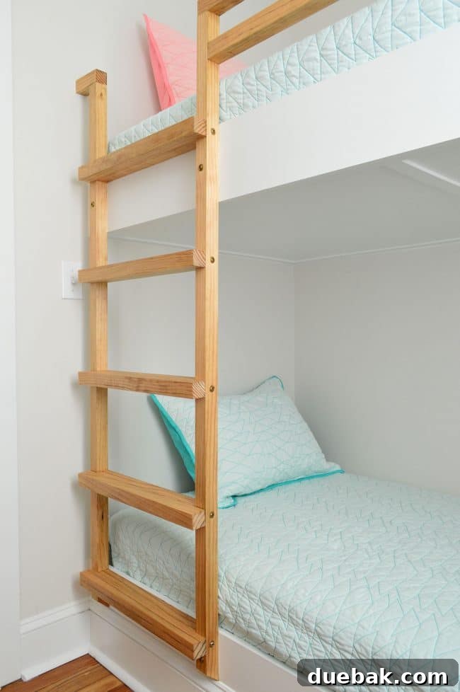 Constructing Bespoke Bunk Beds 27 The stained wood ladder for the wall-to-wall bunk beds, showcasing the rich color and smooth finish.