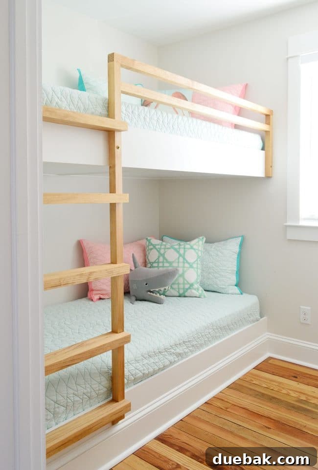 Constructing Bespoke Bunk Beds 33 Completed DIY built-in bunk beds featuring a raw wood railing and ladder, beautifully integrated into a small, inviting room.