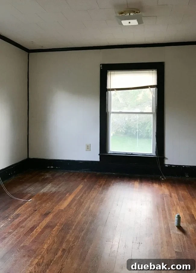 Redefining Duplex Spaces 14 Original view of the back bedroom before renovation