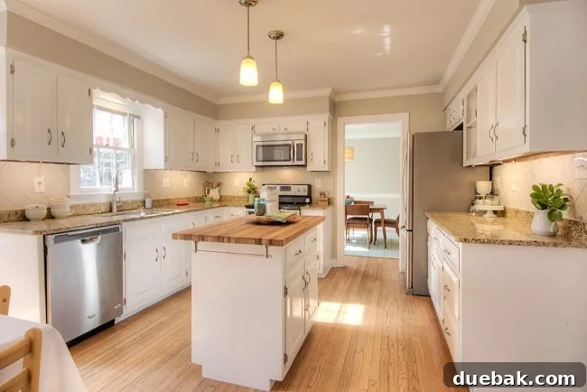 Avoid These Home Changes That Hurt Resale Value 6 Staged kitchen with island in center