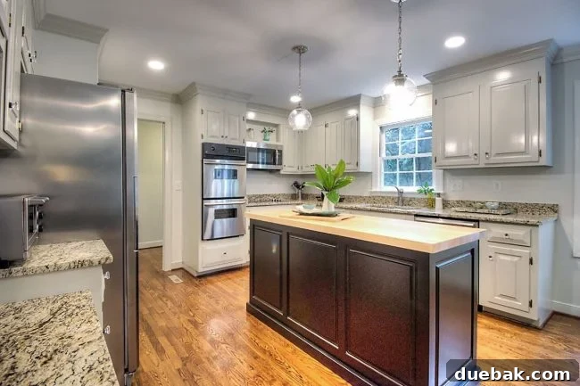 Home Staging Tips: Sell Your House or Simplify Your Life 16 kitchen staged to sell by removing items on counters and refrigerator, revealing its true potential