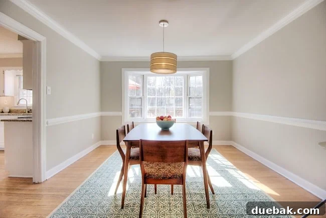 Home Staging Tips: Sell Your House or Simplify Your Life 26 living room staged to sell with neutral walls and simple table, showcasing updated dining area