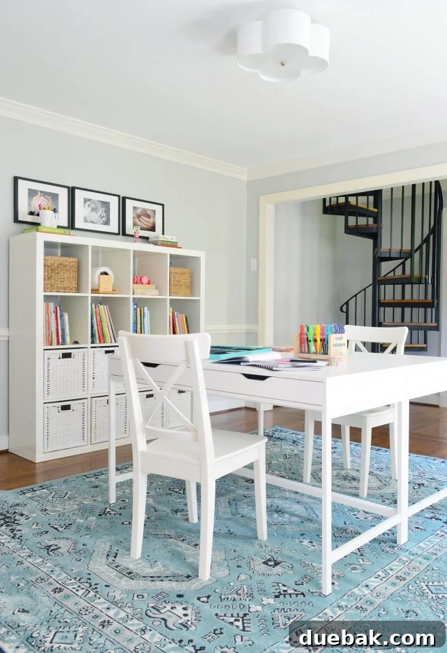 Home Staging Tips: Sell Your House or Simplify Your Life 6 homework room decorating with blue rug and lots of objects on walls and table, before staging