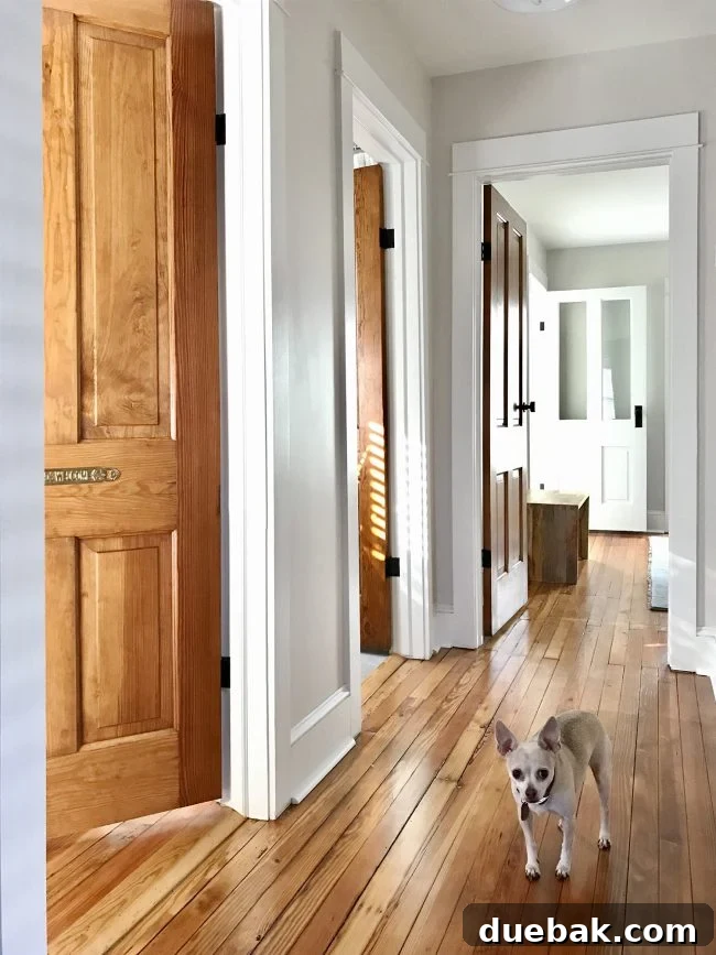 Restored original doors in the pink beach house, showcasing renovation quality