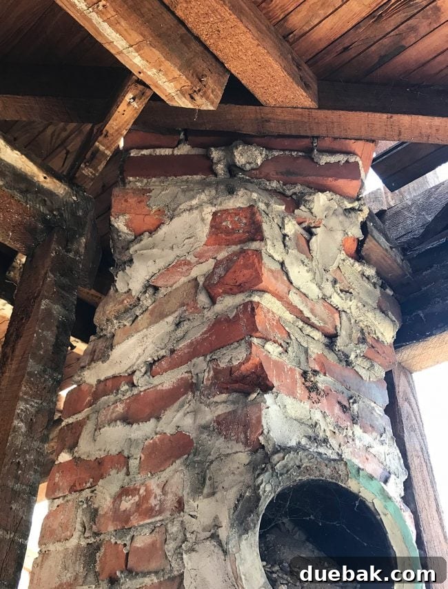 Close-up of the twisted chimney as it passes through the first-floor ceiling.