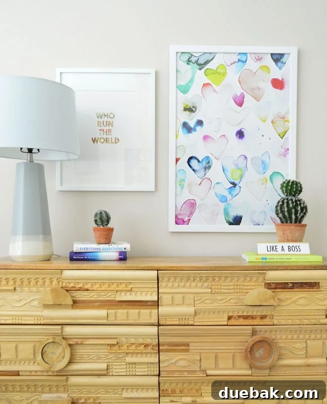Sneak peek of a third child's room, showcasing unique artwork and a comfortable bed, created for ASK charity
