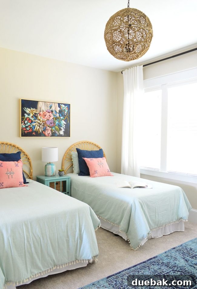 Boho jute light fixture hanging in S's bedroom, casting beautiful light patterns