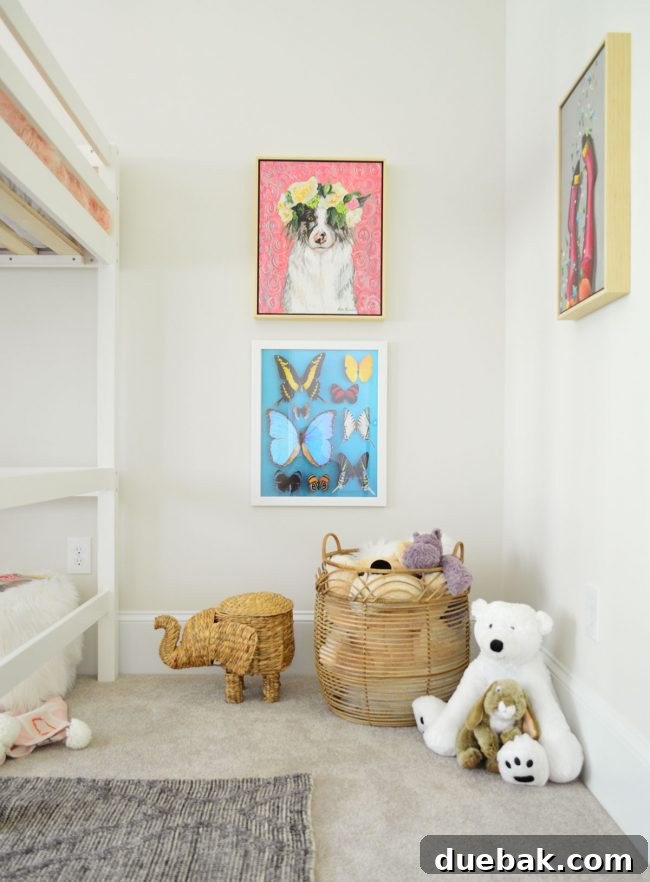Beautiful framed butterfly art print by Jenny Komenda in A's bedroom
