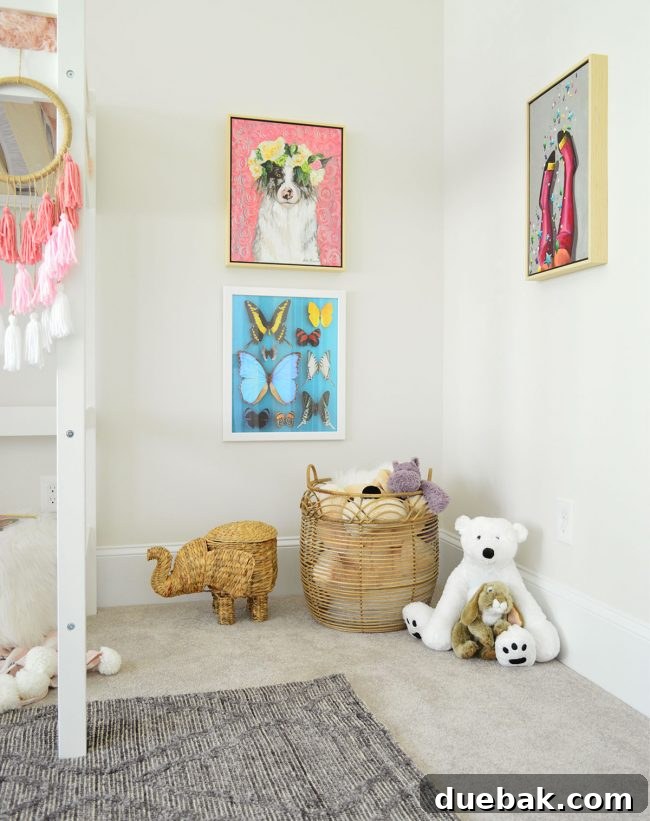 Cozy play nook in A's bedroom with an elephant basket and stuffed animals, showcasing nature theme