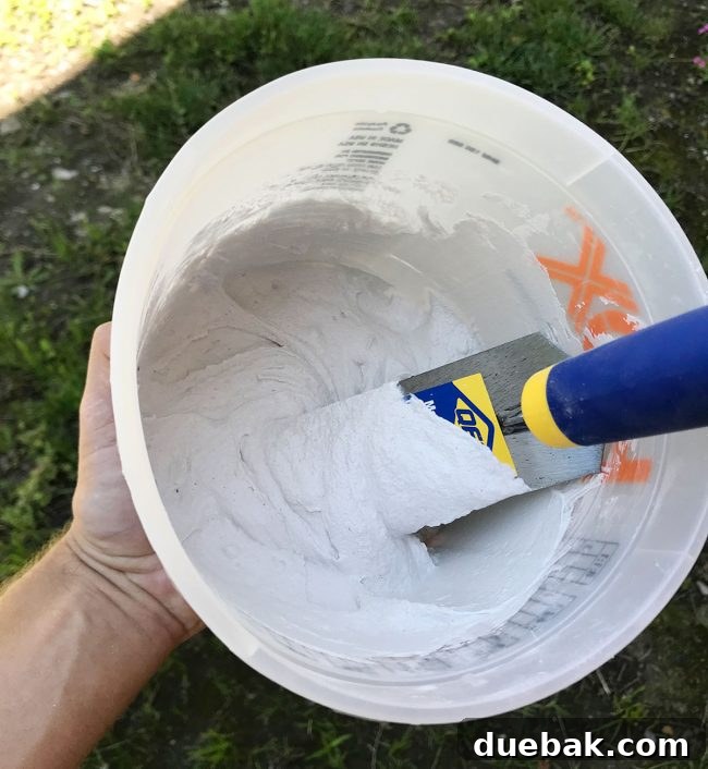 The ideal 'thick pancake batter' consistency of mixed Ardex