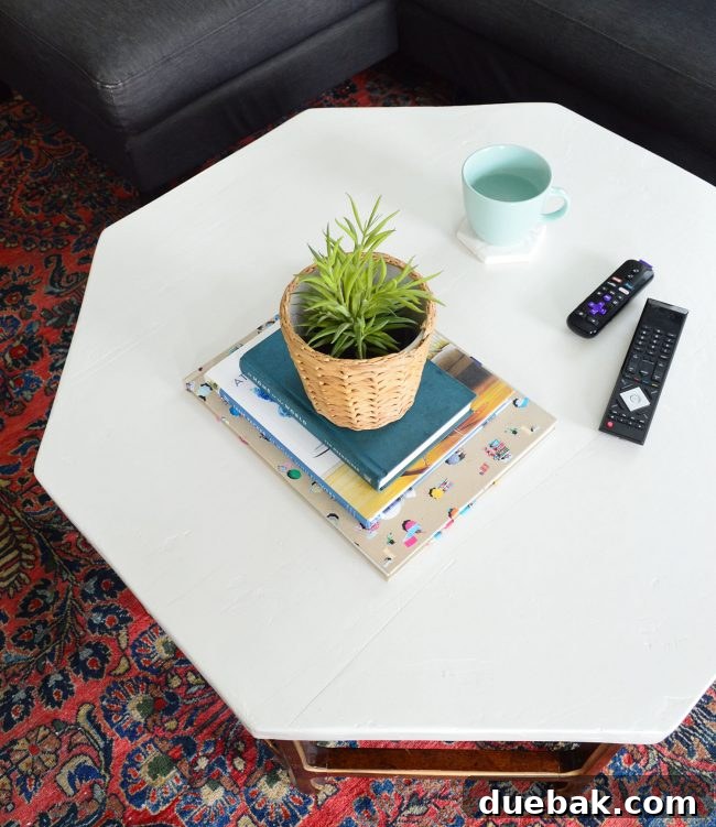 Detailed view of the concrete coffee table showing subtle imperfections