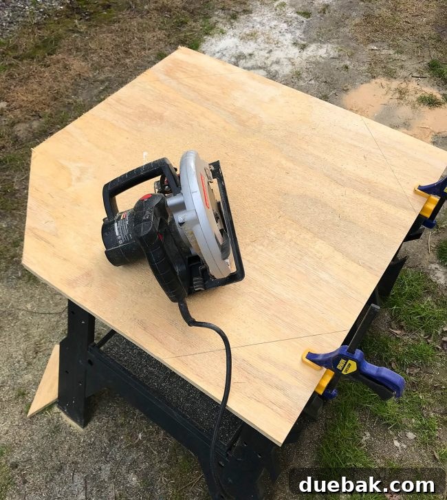 Cutting the octagonal plywood top with a circular saw