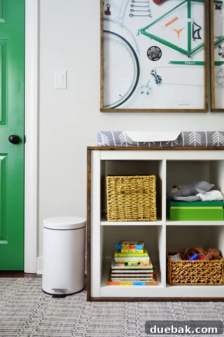 Seamless Malm Dresser Integration 17 Wood-wrapped IKEA Expedit bookcase transformed into a functional changing table in a nursery