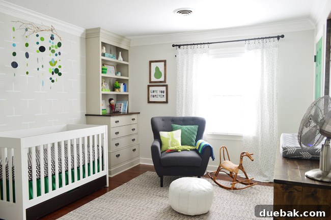 Seamless Malm Dresser Integration 18 Boys' nursery featuring built-in bookshelves created using IKEA Fjell dressers